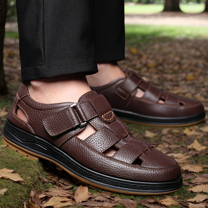 Casual men's closed-toe summer sandals with adjustable straps, essential versatile footwear for spring.