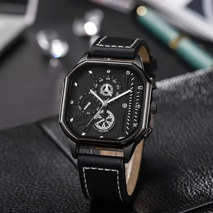 Statement men's Arcane Chronos watch with square dial and classic leather band, perfect for elegant attire.