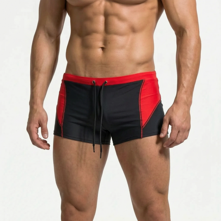Men's athletic fitted color-block swimwear, ideal boxer trunks for beach, pool, and active summer fun.