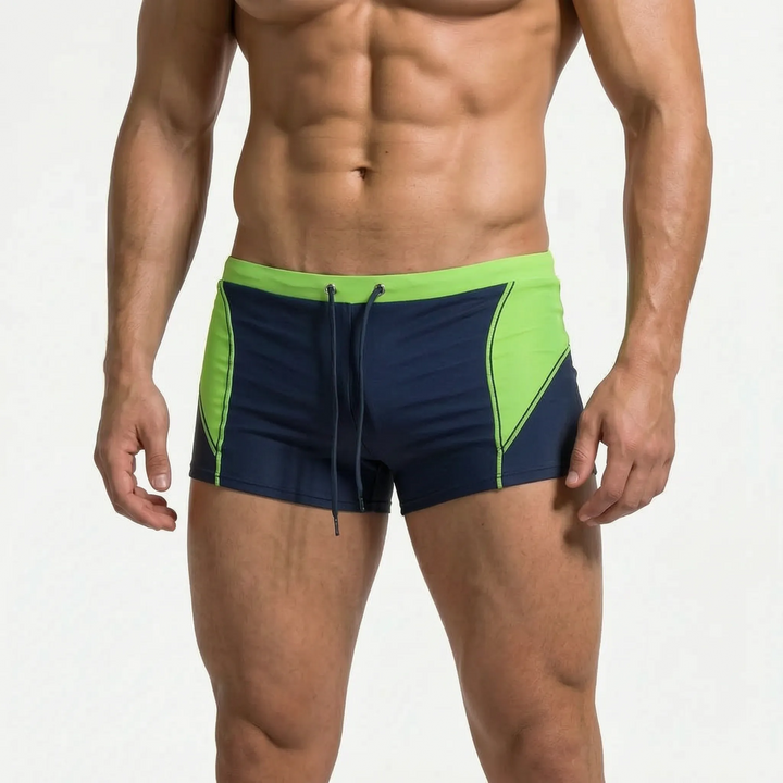 Vibrant color-block men's swim shorts, perfect quick-dry beachwear for pool, ocean & water sports.