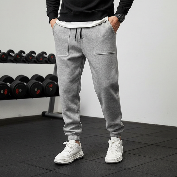 Men's athletic performance pants with comfortable elastic waist. Ideal for workouts & active wear.