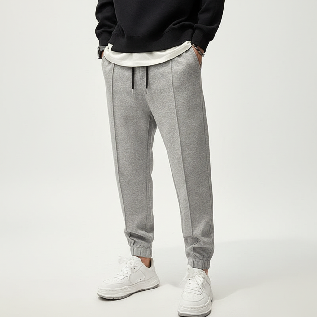 Tanner men's performance sport pants, flexible fit with elastic waist for ultimate comfort.