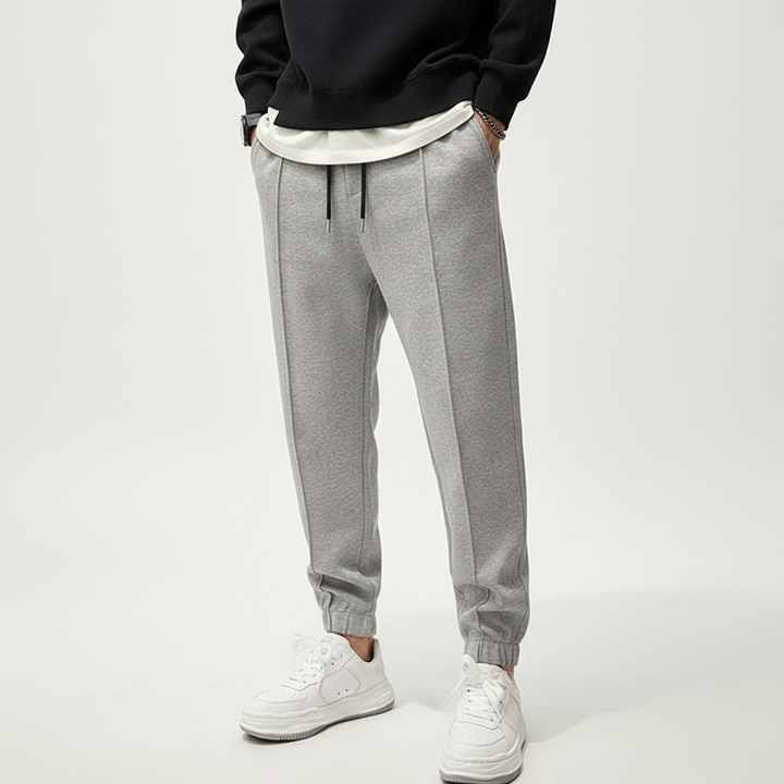 Tanner men's performance sport pants, flexible fit with elastic waist for ultimate comfort.
