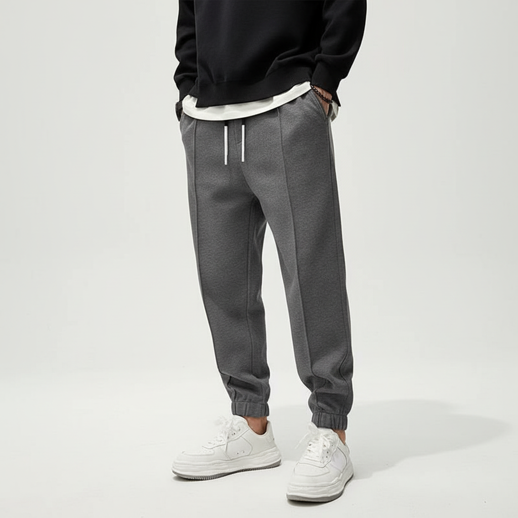 Men's performance sport pants, elastic waist for unrestricted movement & gym comfort.