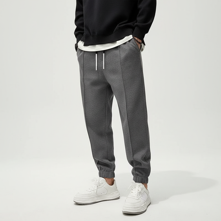 Men's performance sport pants, elastic waist for unrestricted movement & gym comfort.