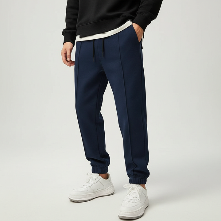 Tanner men's athletic performance pants, elastic waist. Designed for gym & active lifestyles.
