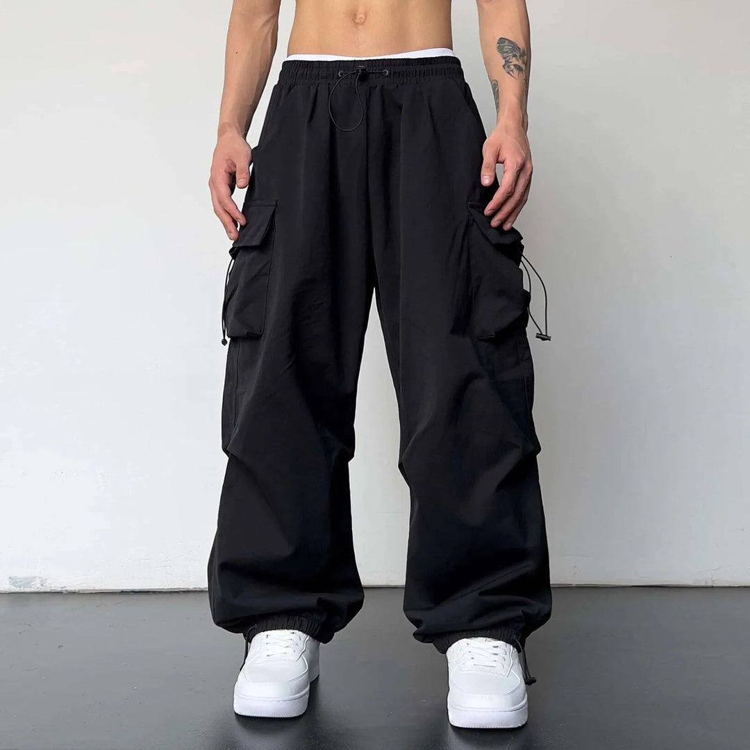 Y2K men's baggy parachute cargo pants, perfect for streetwear; offers a comfortable loose fit & multi-pockets for utility.