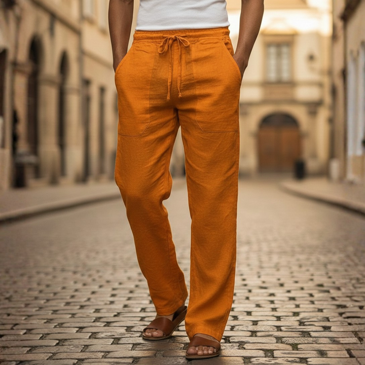 Front view of men's baggy linen drawstring trousers, showcasing the loose, comfortable summer fit.