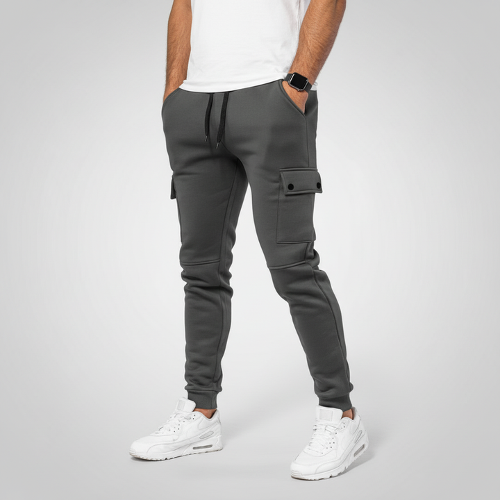 Men's modern fit cropped joggers with a secure pocket, offering stylish athletic comfort for any activity.