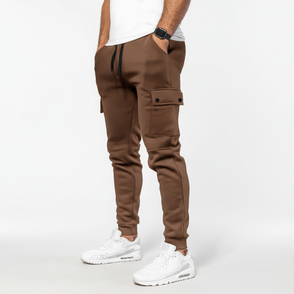 Urban style men's cropped joggers with a convenient pocket, providing comfortable activewear & modern flair.