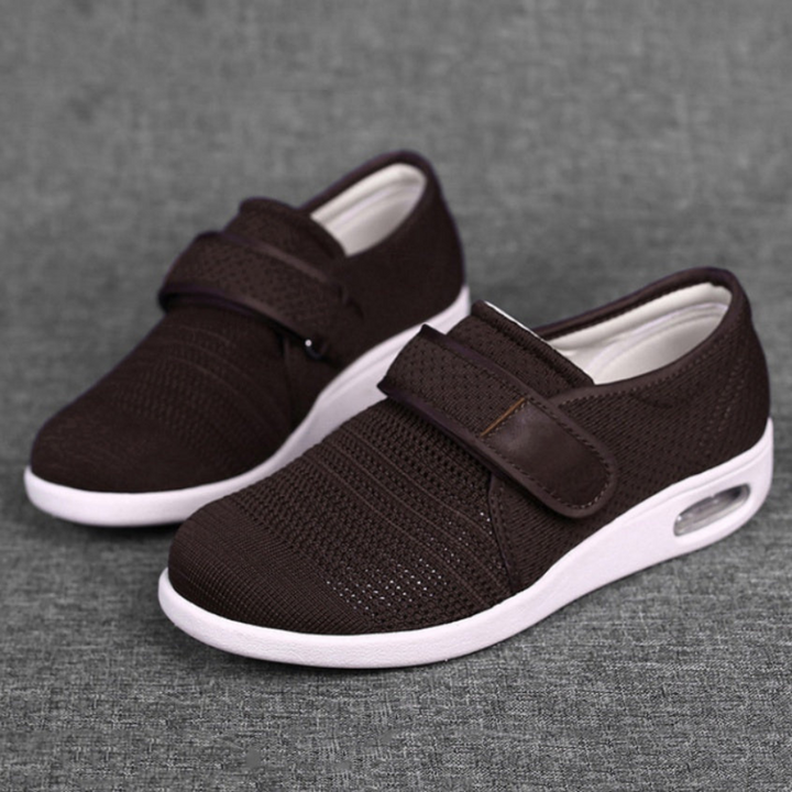 Men's black orthopedic comfort walking shoes with easy hook-and-loop closure for adjustable, supportive fit.