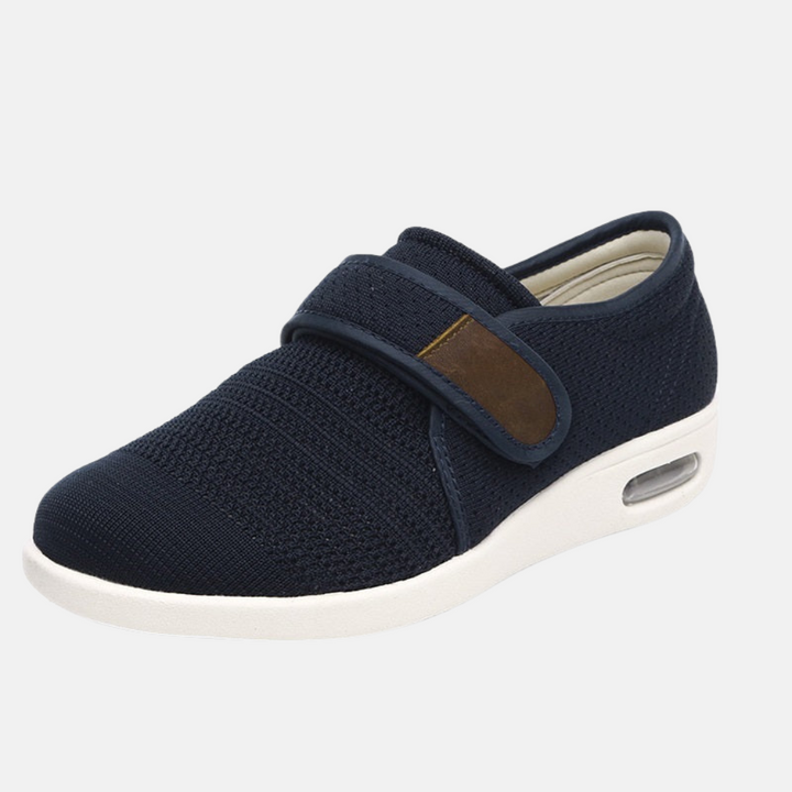 Detail of men's casual orthopedic comfort shoes featuring an easy hook-and-loop closure for quick, adjustable fit.