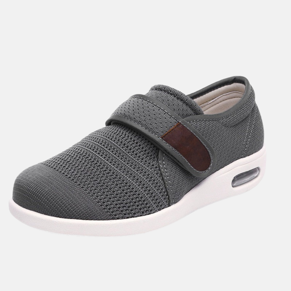 Comfortable men's orthopedic shoes in a casual style, featuring a soft upper and easy hook-and-loop closure for support.