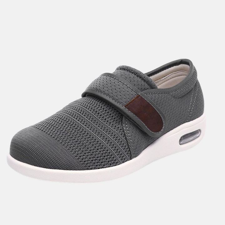 Comfortable men's orthopedic shoes in a casual style, featuring a soft upper and easy hook-and-loop closure for support.