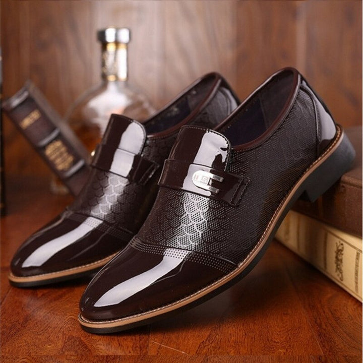 Stylish brown patent finish men's dress shoes featuring an elegant buckle. Perfect formal shoes for business attire & events.