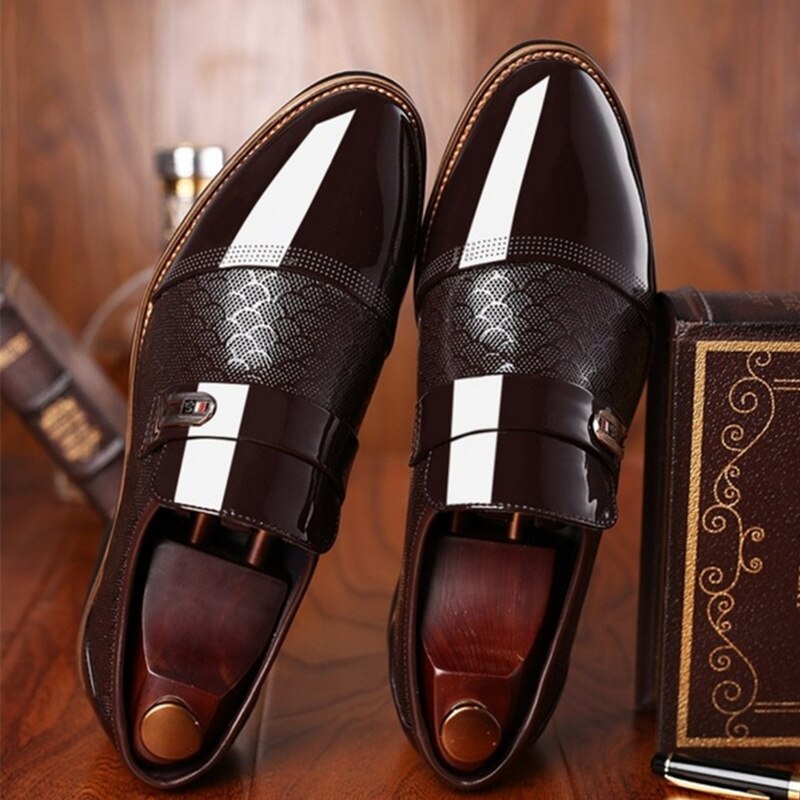 Luxurious men's patent leather buckle dress shoes, reflecting high shine. Essential formal footwear for any special occasion.