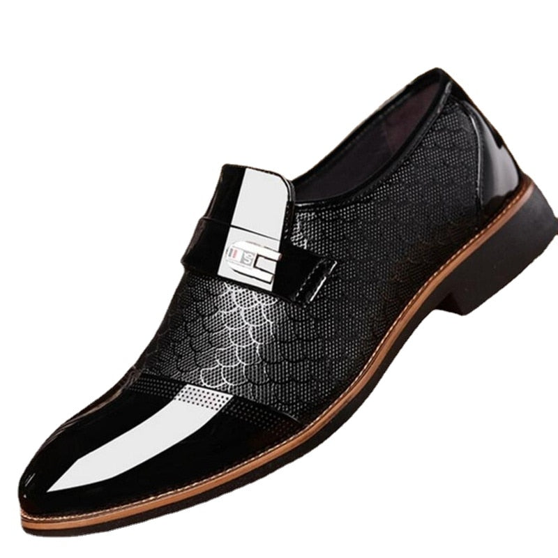 Detailed view of men's patent dress shoes with a sophisticated buckle. Modern formal footwear for weddings & business events.