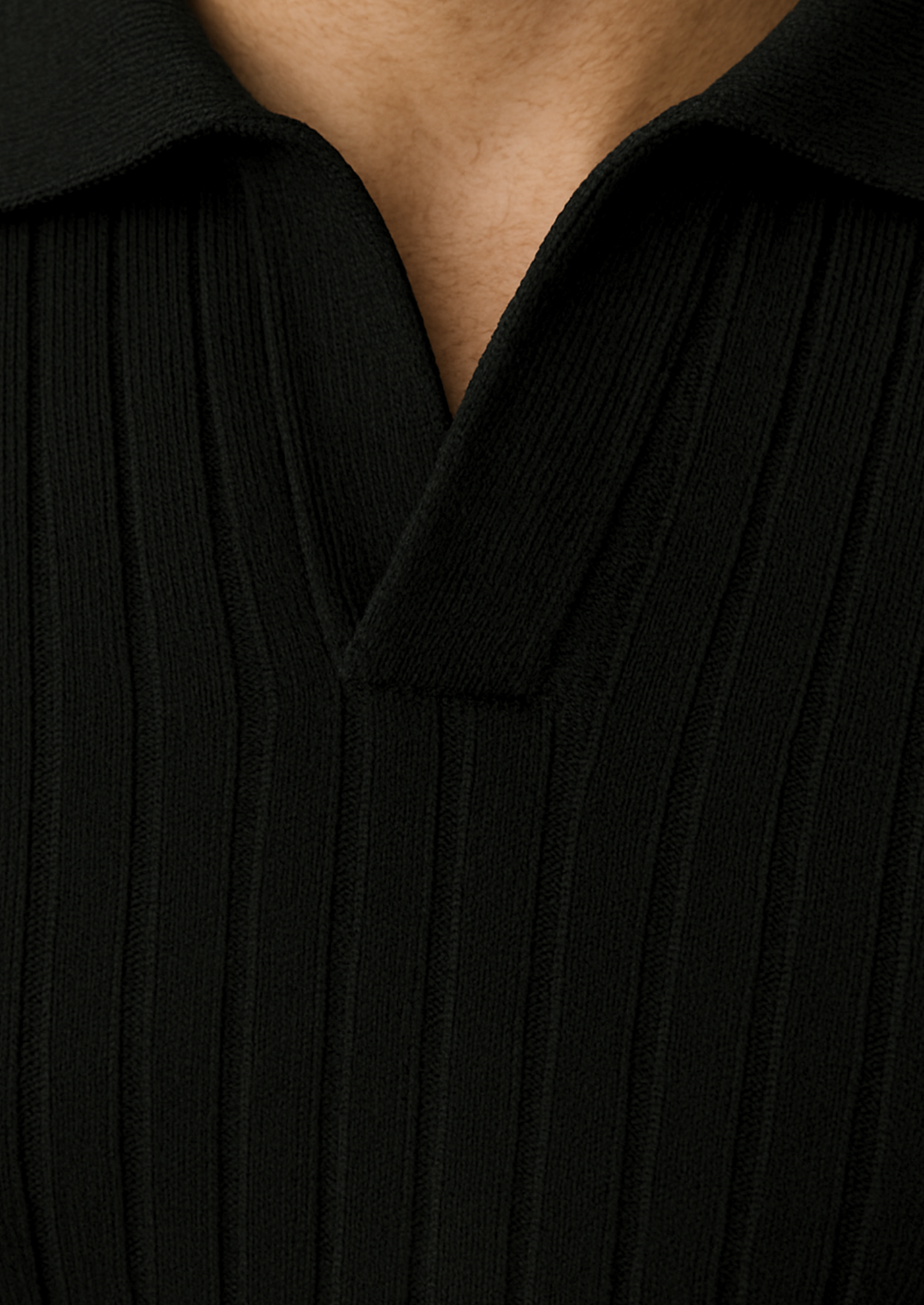Men's black ribbed polo sweater. Long sleeve, open collar design for a versatile smart casual or casual look.