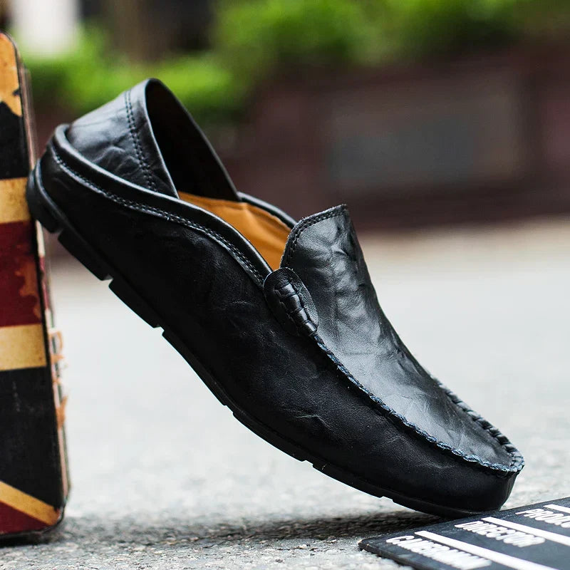 Men's black slip-on comfort loafers, perfect everyday shoes for effortless style & quick wear.