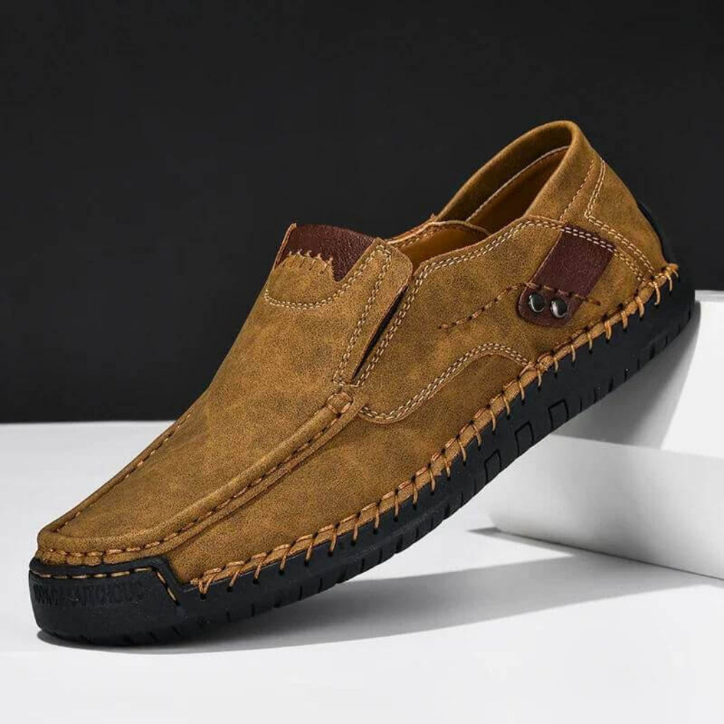 Men's black slip-on shoes with arch support, ideal for comfortable all-day casual wear and walking.