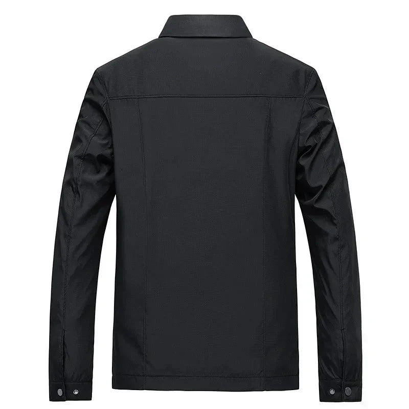 Versatile men's black jacket. Features a full zip-up front and classic checked inner lining.