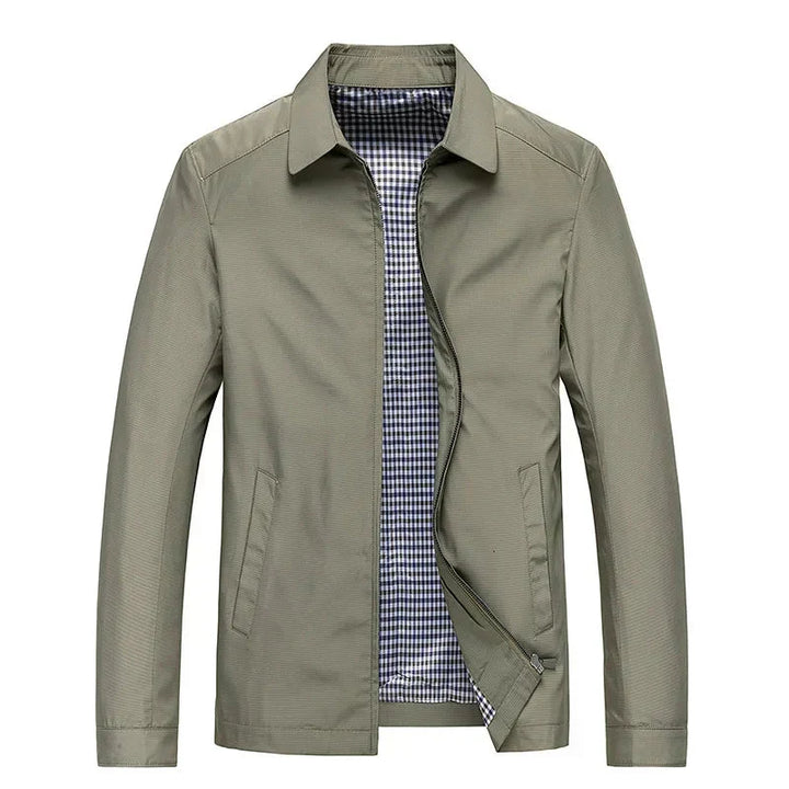 Men's all-season black zip-up jacket. A smart casual outerwear piece with a distinctive checked lining.