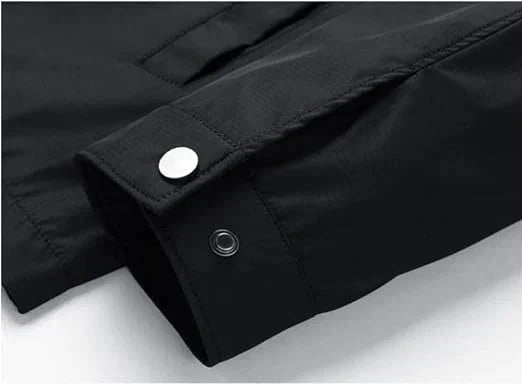 Everyday men's black outerwear. A modern zip-up jacket featuring a chic checked lining.