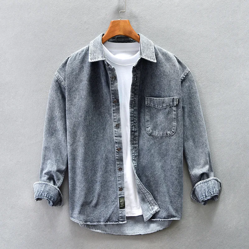 Comfortable men's washed denim button-up shirt with chest pocket, perfect for versatile casual wear.