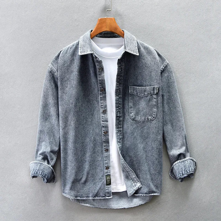 Comfortable men's washed denim button-up shirt with chest pocket, perfect for versatile casual wear.