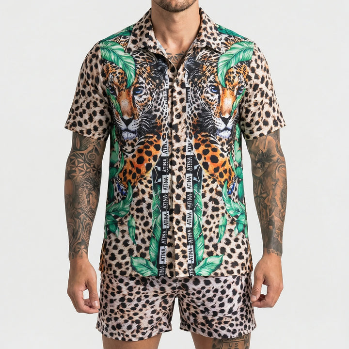 Stylish men's two-piece summer outfit with a bold graphic print, perfect for resort and casual wear.