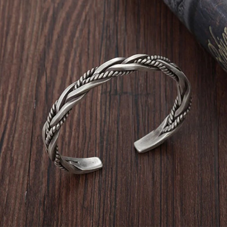 Oxidized sterling silver men's braided cuff bracelet. A rugged yet elegant adjustable silver bracelet.