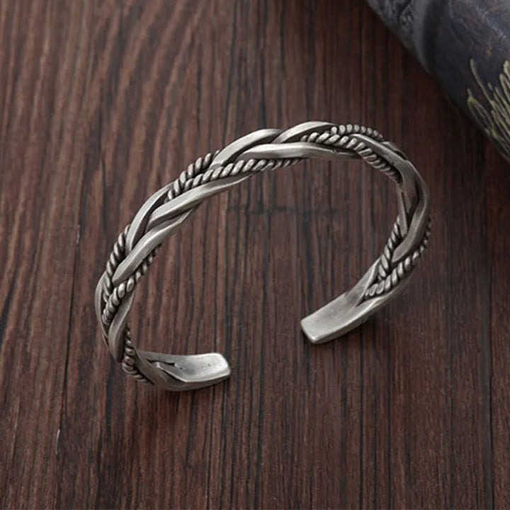 Oxidized sterling silver men's braided cuff bracelet. A rugged yet elegant adjustable silver bracelet.