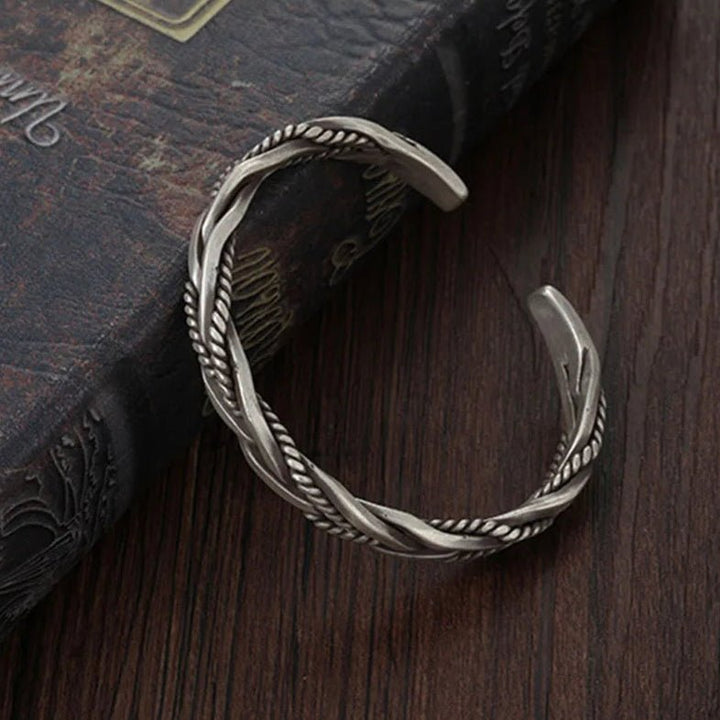 Gift for him: a sophisticated men's braided sterling silver open cuff bracelet, adjustable and comfortable.