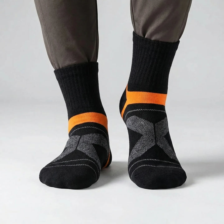 Moisture-wicking men's ankle athletic socks, 3 pack. Breathable and cushioned for active sports and running.