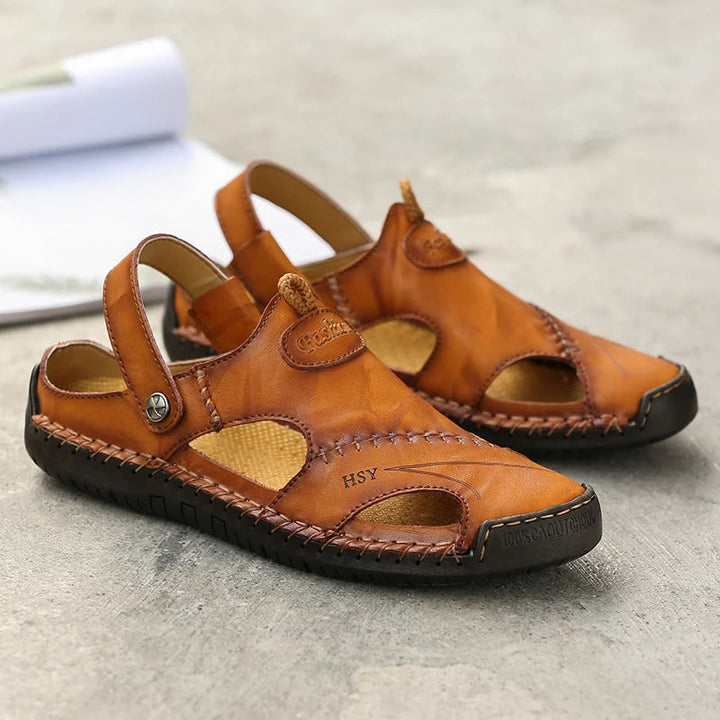 Durable men's closed-toe slip-on sandals, breathable, with arch support for daily & outdoor use.