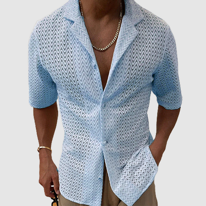 Men's breathable open-weave leisure shirt, perfect for warm summer days. Comfortable relaxed fit short sleeve casual top.