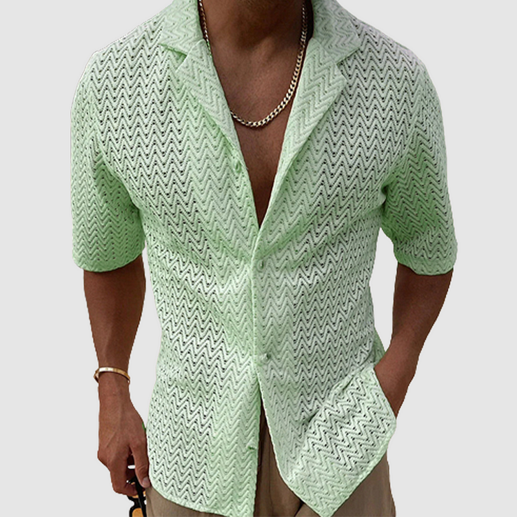 Lightweight men's open-weave button-up shirt in a relaxed fit. Breathable and comfortable for summer casual wear.