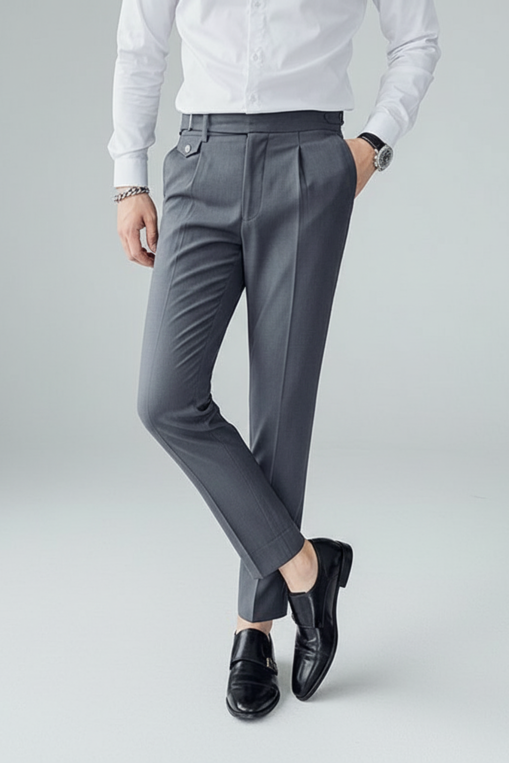 Classic British men's pleated trousers, versatile for business, office wear, or smart professional style.