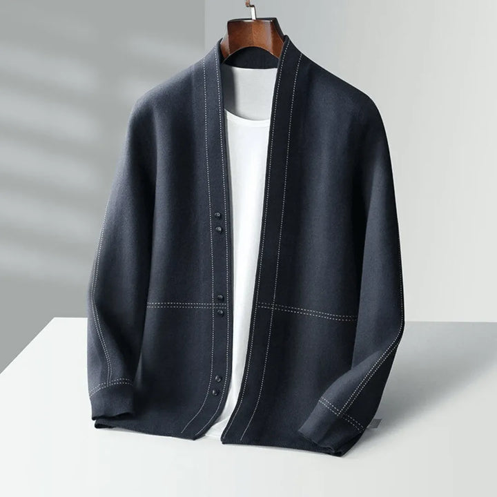 Man wearing a smart casual button-front knit cardigan, showcasing versatile menswear layering & style.