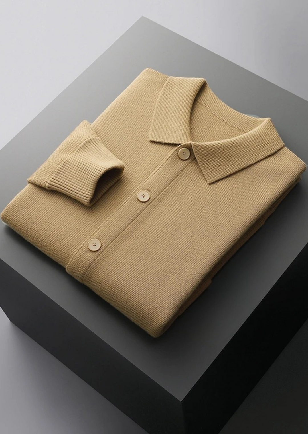 Comfortable men's long-sleeve button-up cardigan with patch pockets. Soft everyday knit for fall and winter wear.