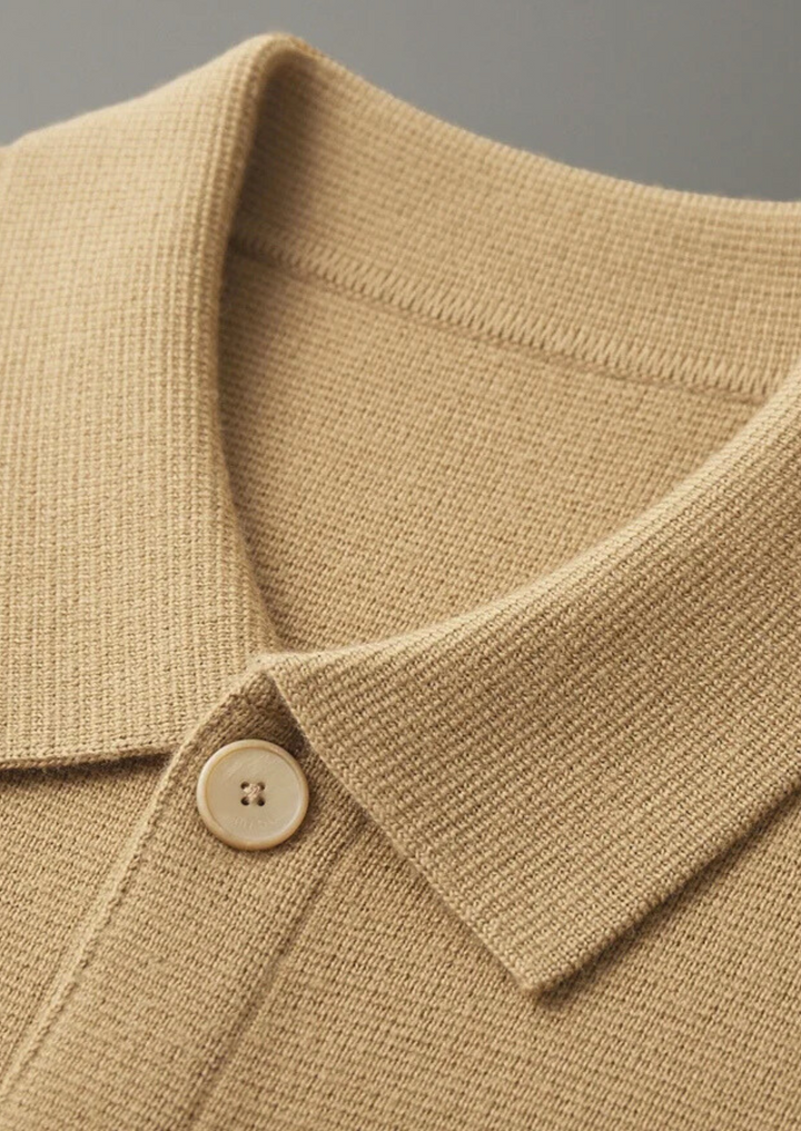 Stylish men's button-up cardigan, perfect for versatile everyday layering. Features patch pockets & a smart casual look.