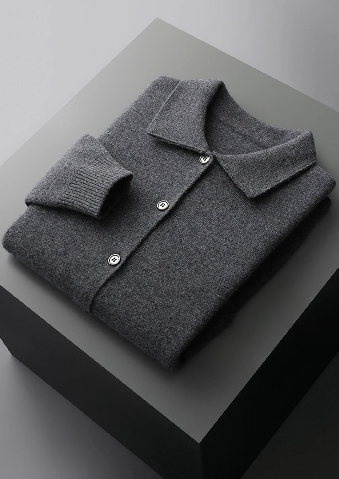 Fall/winter men's button-up cardigan. Features patch pockets, ideal for comfortable, smart casual long-sleeve layering.