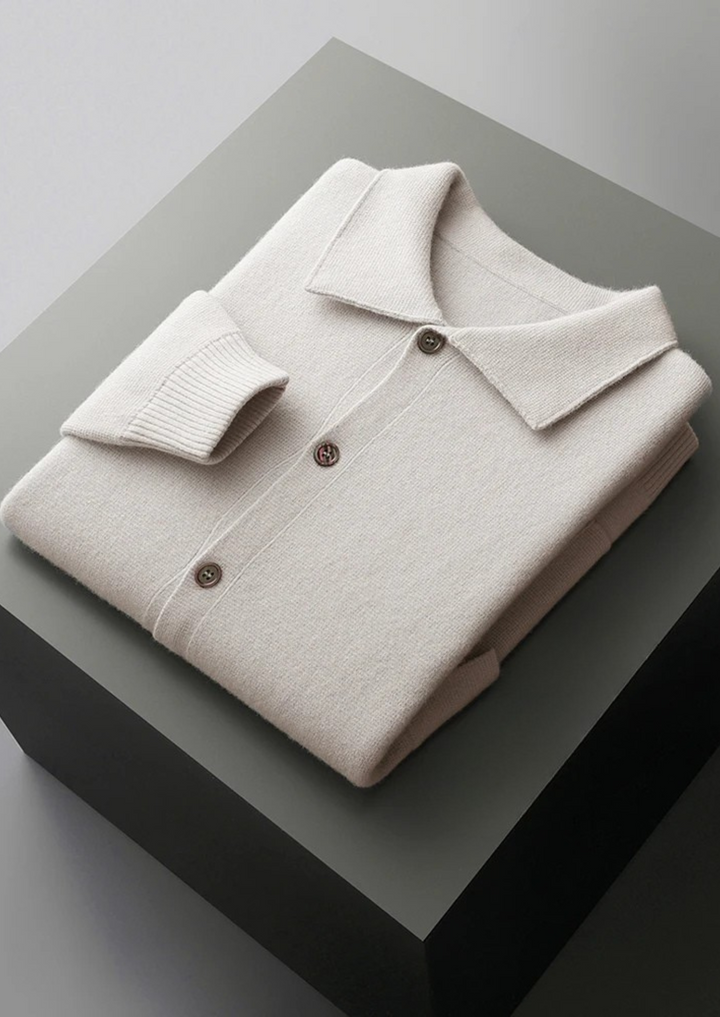 Men's ribbed button-up cardigan with patch pockets. Comfortable long-sleeve knit for versatile fall and winter layering.