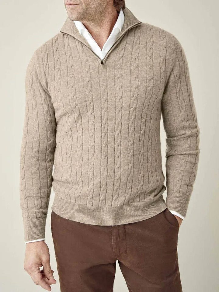 Front view of a men's half-zip cable knit jumper featuring a prominent stand collar for warmth.
