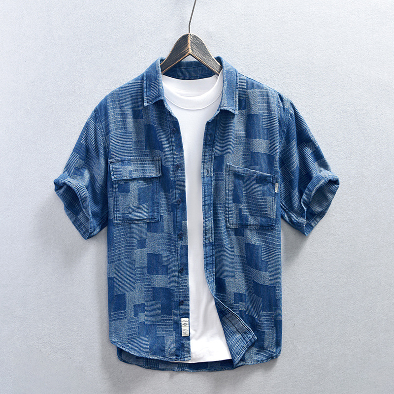 Men's casual blue denim shirt, long sleeve, button-up, relaxed fit for stylish everyday wear.