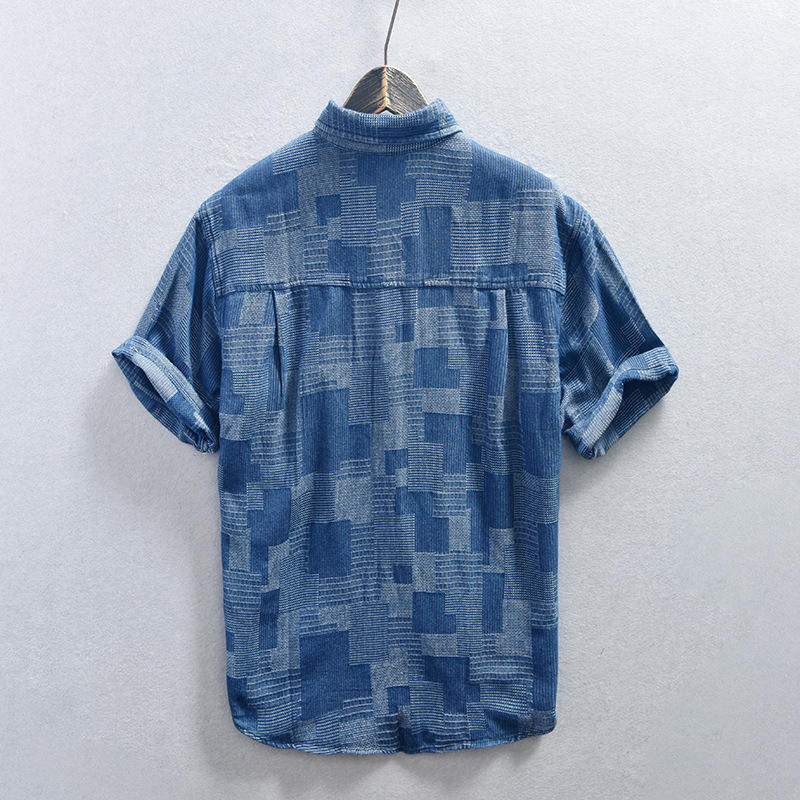 Stylish men's black denim shirt with geometric pattern, long sleeve, perfect for smart casual outfits.