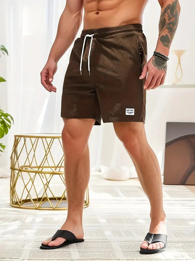 Essential men's casual drawstring shorts, relaxed fit, a must-have for summer and leisure.
