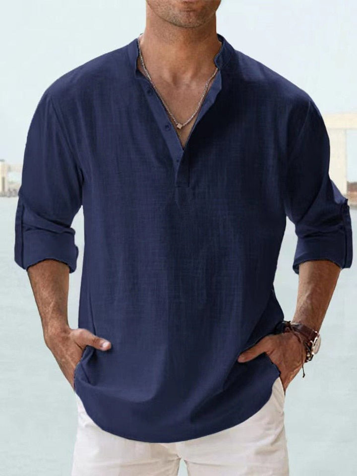 Man wearing a comfortable long sleeve henley shirt with a stylish mandarin collar for casual outings.
