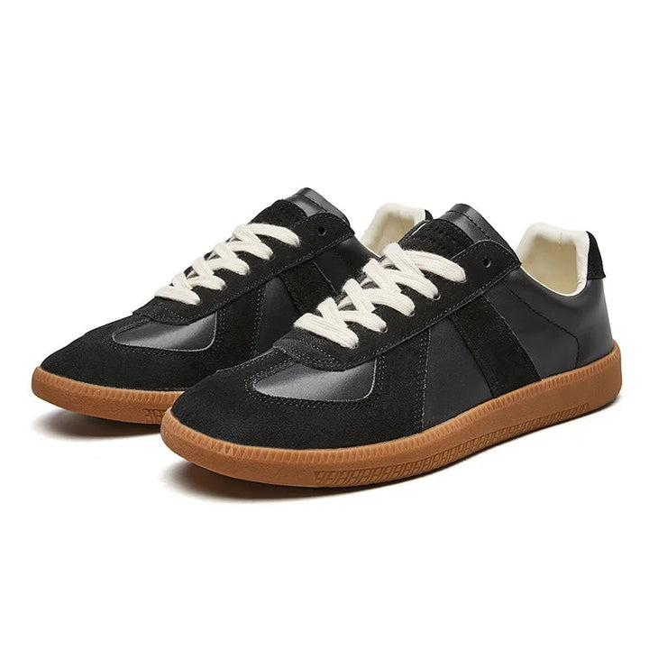 Black men's lace-up low top sneakers, stylish & comfortable for casual everyday wear.