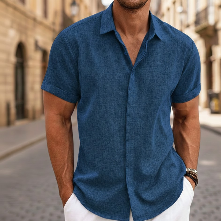 Men's casual short sleeve polo, button-front design, great for relaxed summer days.